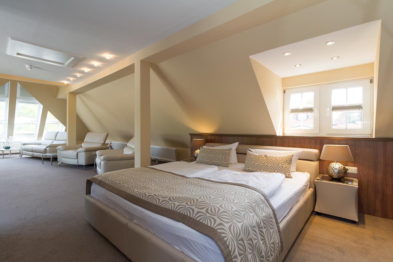 Penthouse Zimmer mit Balkon